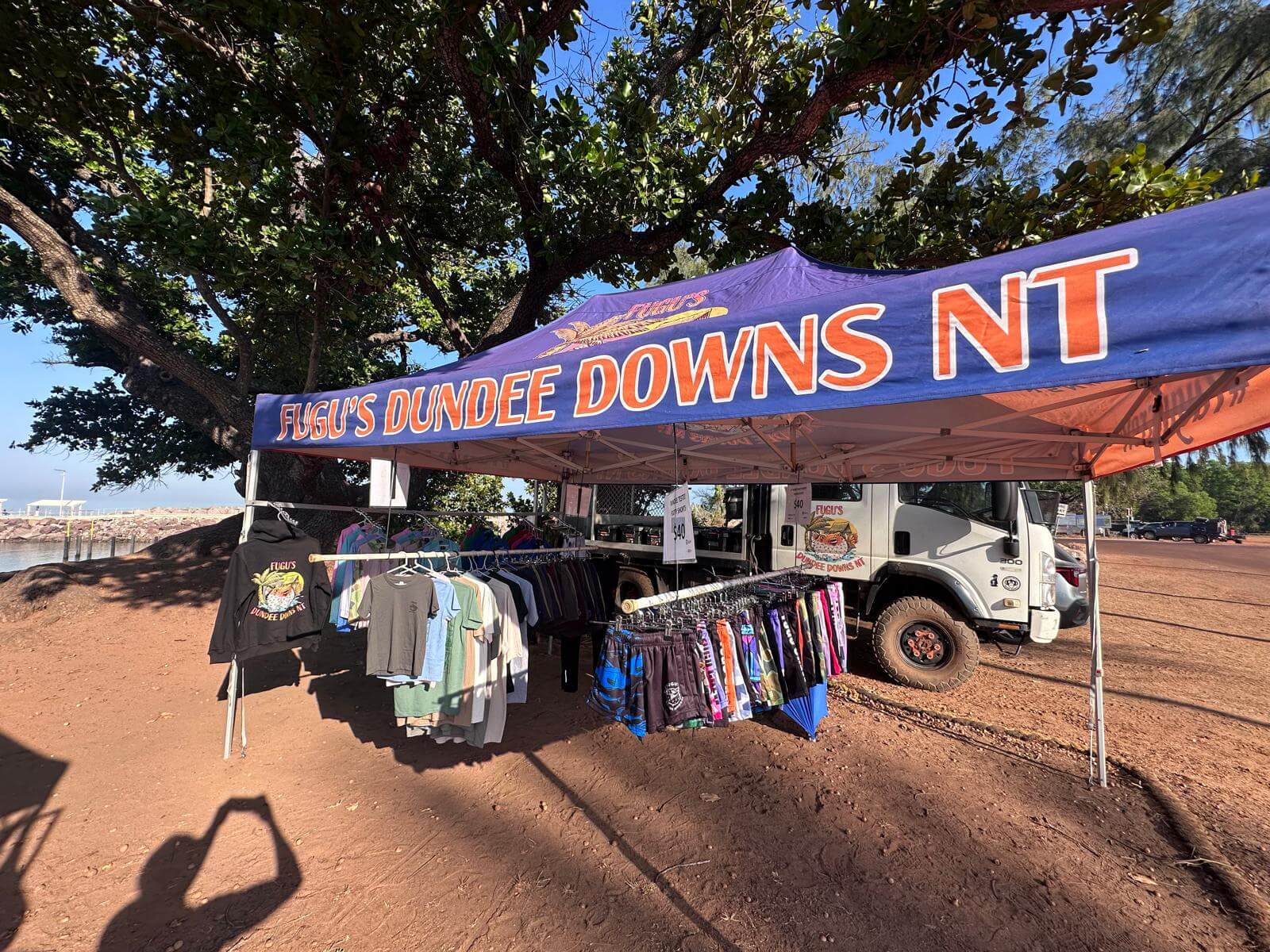 Fugu's Dundee Downs NT clothing stall set up under the trees at the Dundee Beach Markets